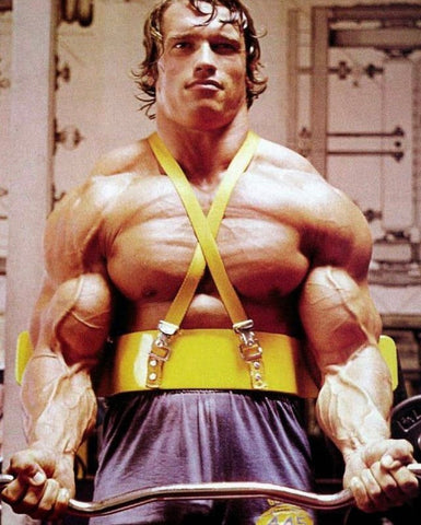 Arnold improving biceps using arm blaster