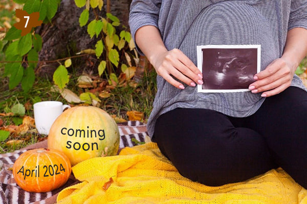 baby scan halloween announcement with pumpkins