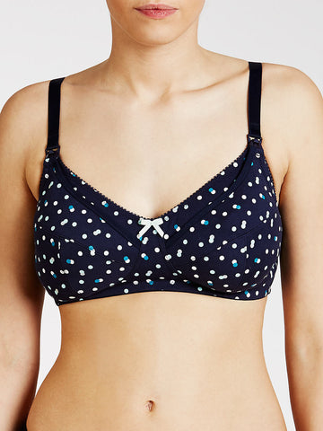 woman wearing navy spot bra