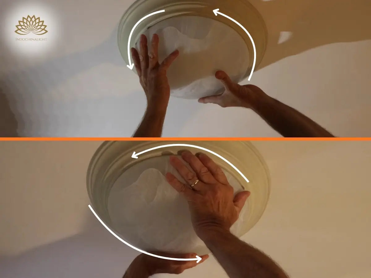 Use the pressure from your palms to rotate the light cover counterclockwise