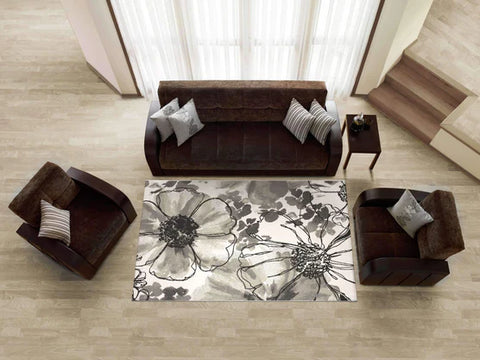 Birds eye view of floral rug design in living room