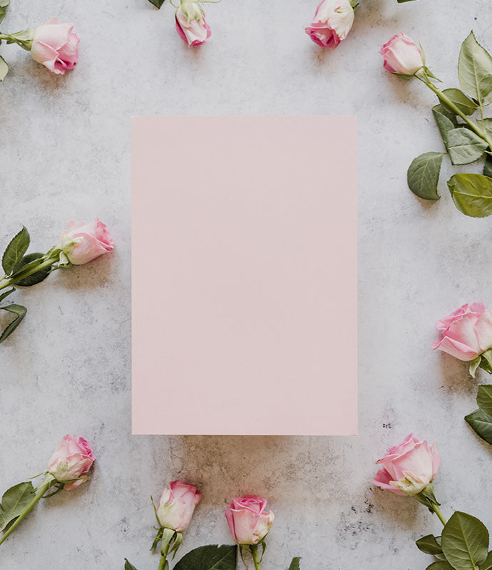 Card surrounded by Roses