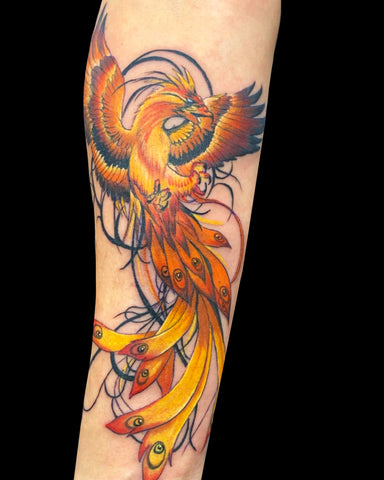 phoenix color tattoo on arm