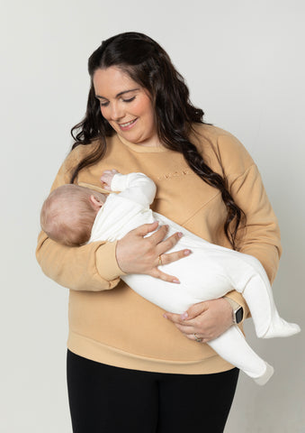 Model Breastfeeding her son