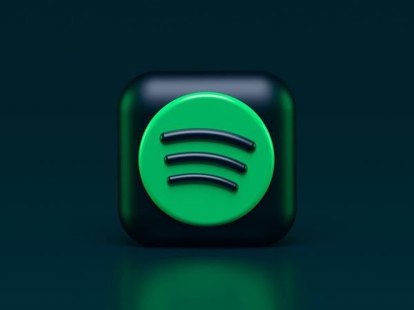 Spotify logo on wallpaper