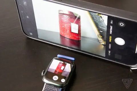 Apple watch being used as a remote control for the mobile phone