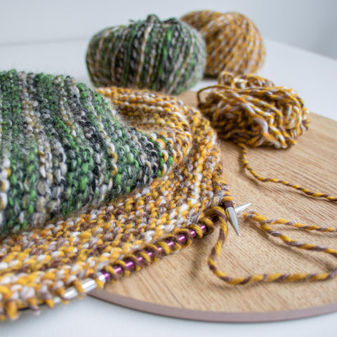 Here's a quick and simple, knitted-in-the-round cowl, using two balls of Katia Savana Mouliné