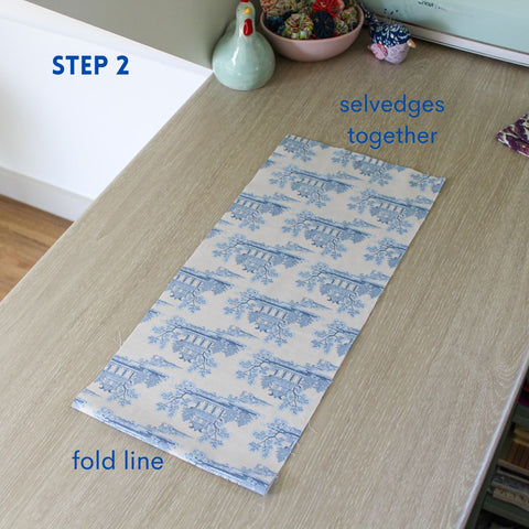 Step 2 Fold down the top selvedge edge.
