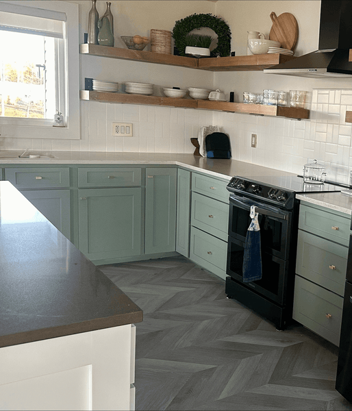 Corner of kitchen, showing floating shelves