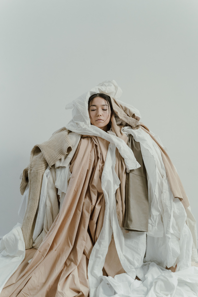Woman covered in layers of clothing