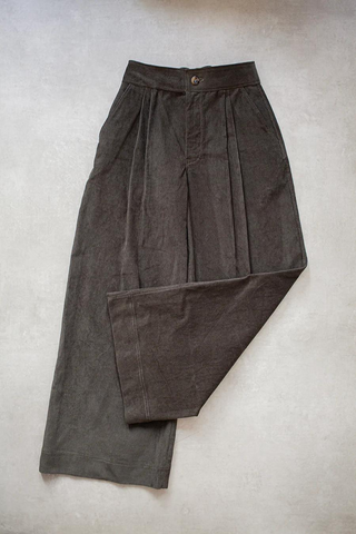 Pair of dark brown wide legged trousers with front pleats