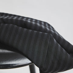 Close up of black striped tencel sewing fabric