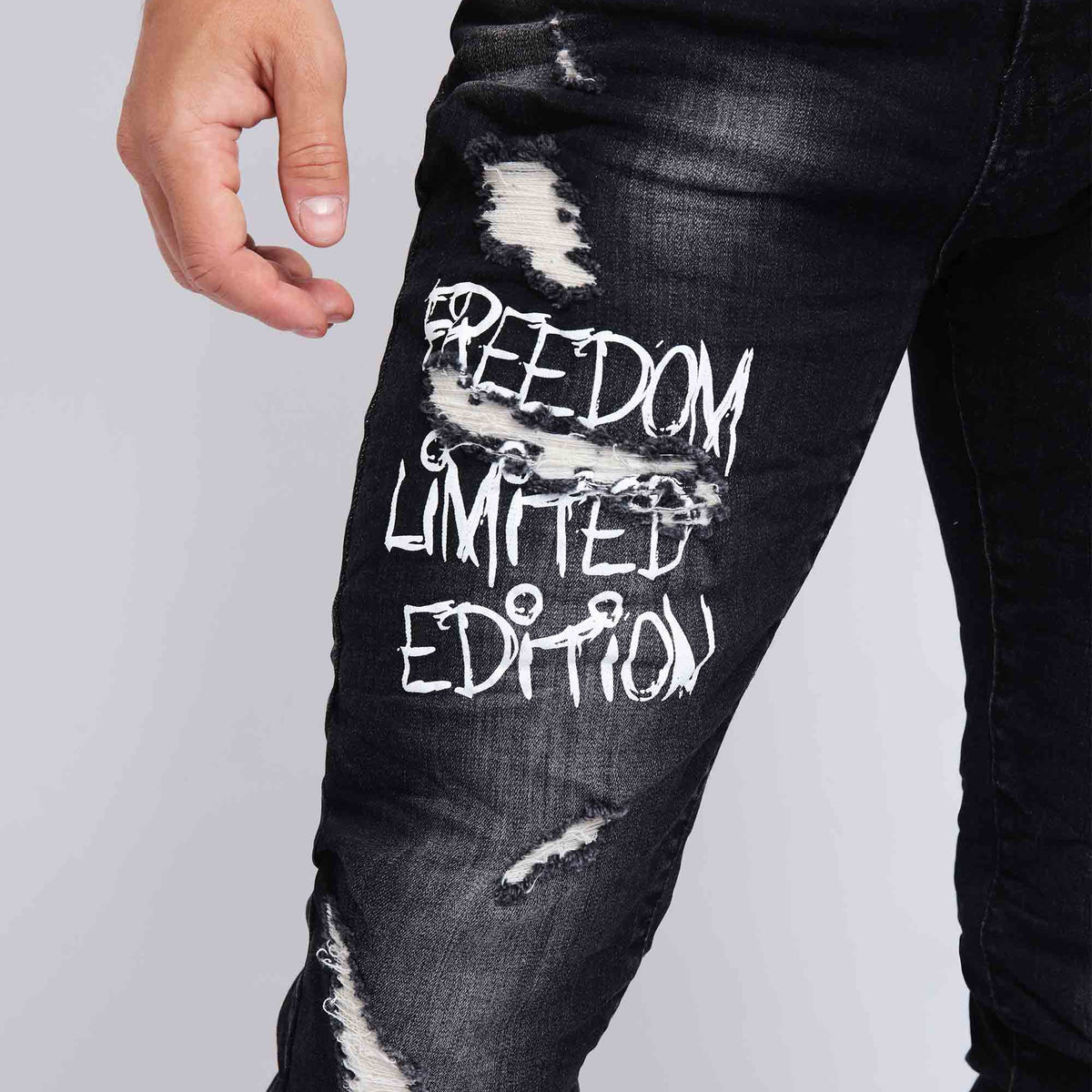 MEDMMNOTHINGNESSWORLD Damaged Tassel Jeans