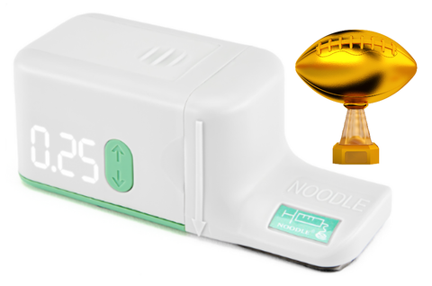 Noodle is an injection aid that reduces or eliminates injection pain. It is shown with a football trophy after it beats injection pain, fear and anxiety.