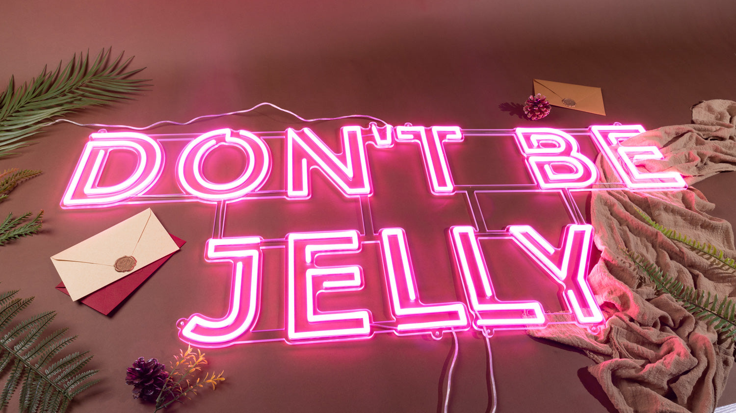 dont be jelly words neon sign in pink