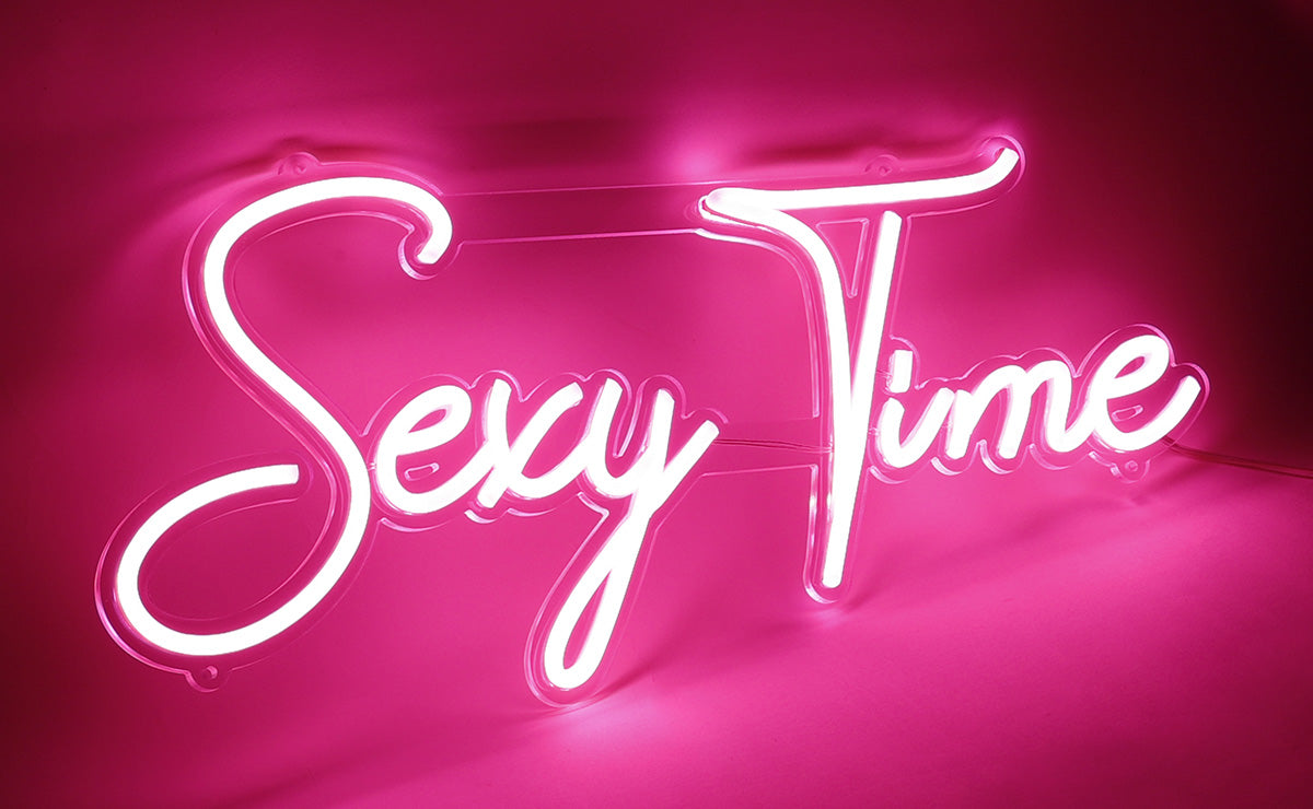 sexy time text neon sign in pink color
