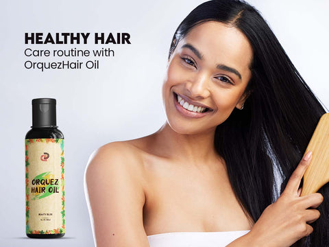 Smiling woman with sleek hair using Orquez Hair Oil