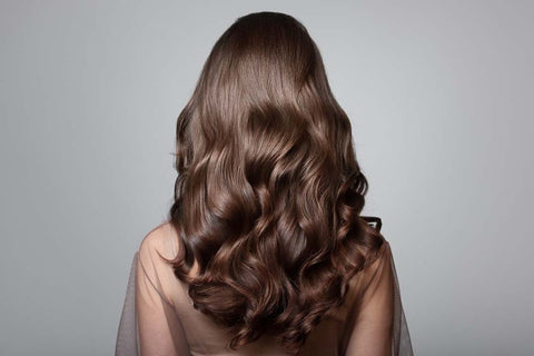 Long-lasting curls ready for a special occasion, set with hairspray