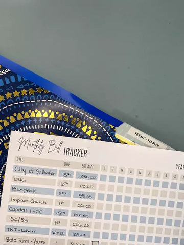 file folder with a monthly bill tracker.