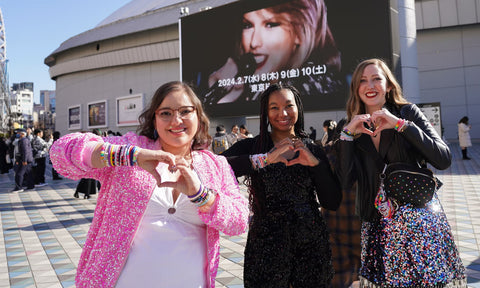 Fans arrive wearing friendship bracelets at the Tokyo Dome. Photograph: Toru Hanai/AP