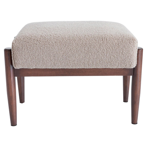 A boucle stool in a mid-century modern setting