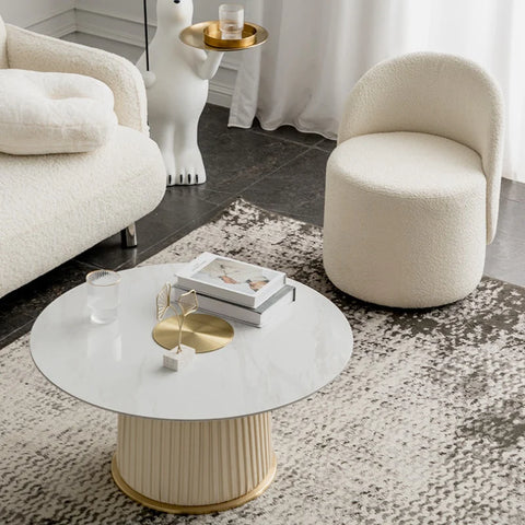 A boucle stool in a contemporary living room setting