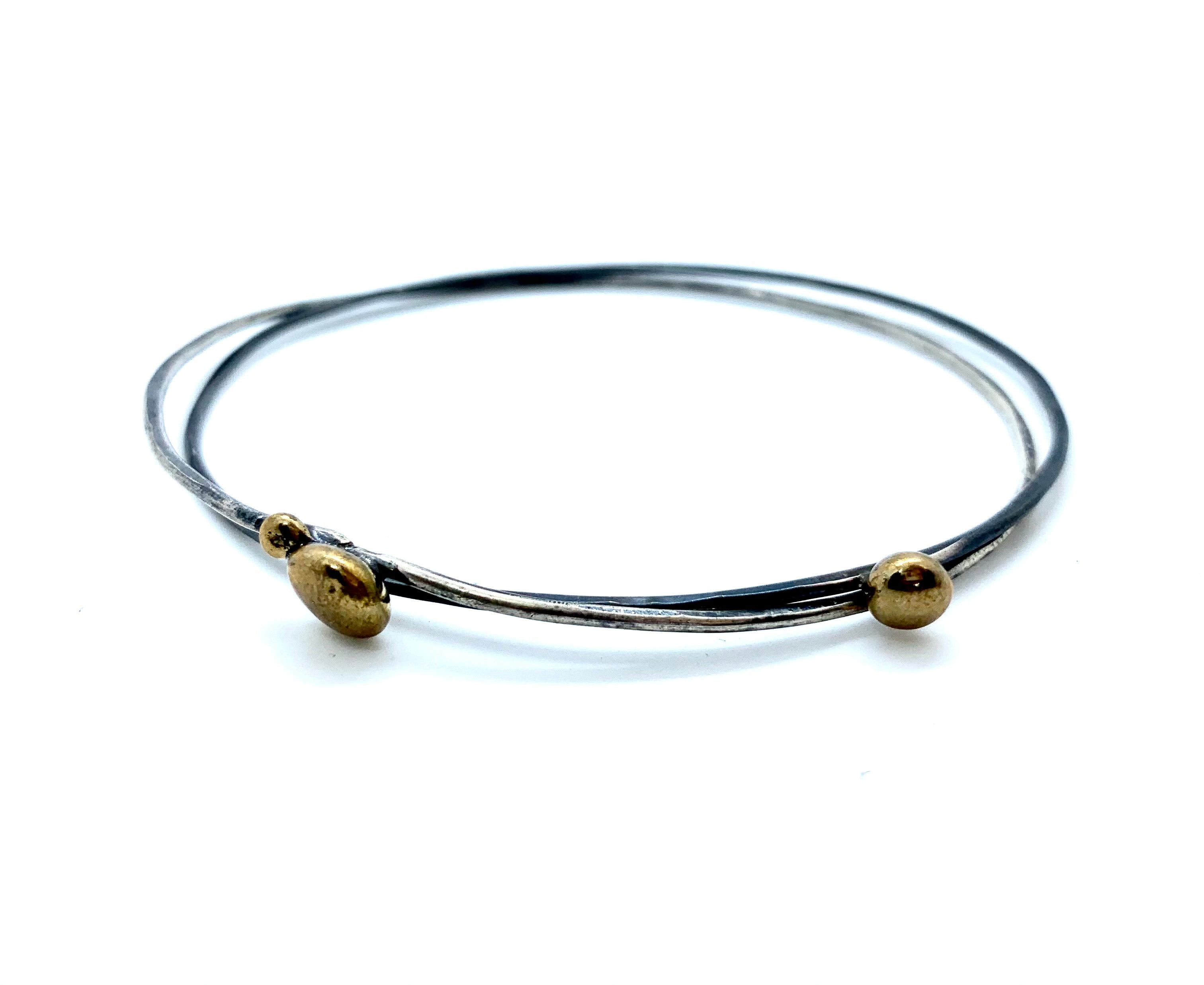 SET OF 2 ORBITAL BANGLES