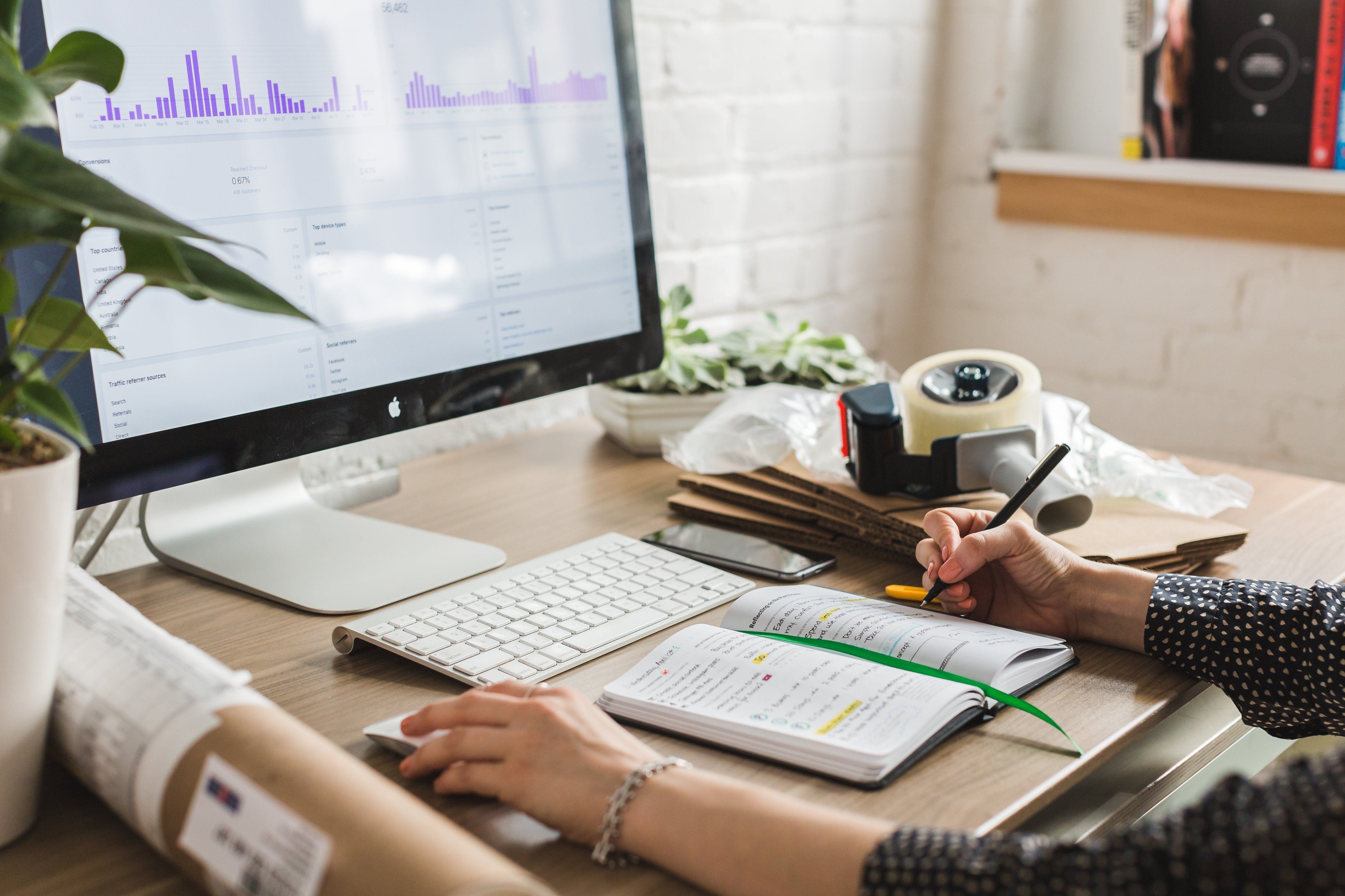 Woman doing ecommerce on laptop