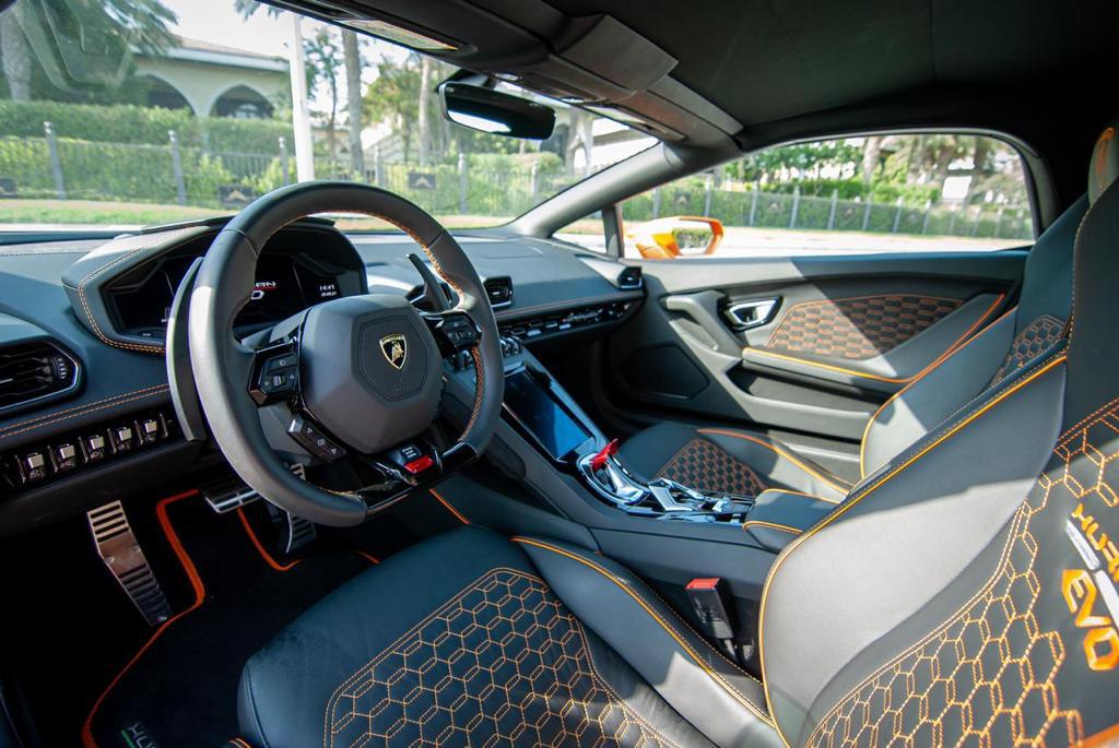 Lamborghini Huracan Spyder Evo ( Orange ) – Turbo Plus Car Rental