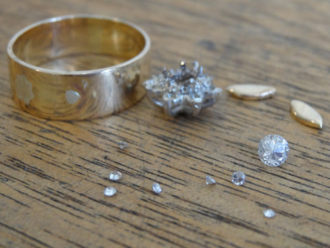 antique, single cut diamonds have been removed from an old ring in order to be remodelled into a unique engagement ring