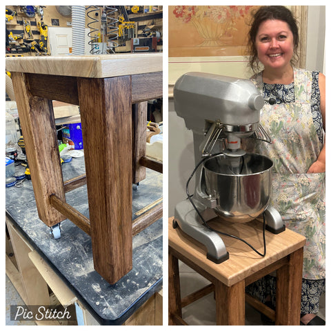 Wooden table for a mixer with happy customer standing alongside