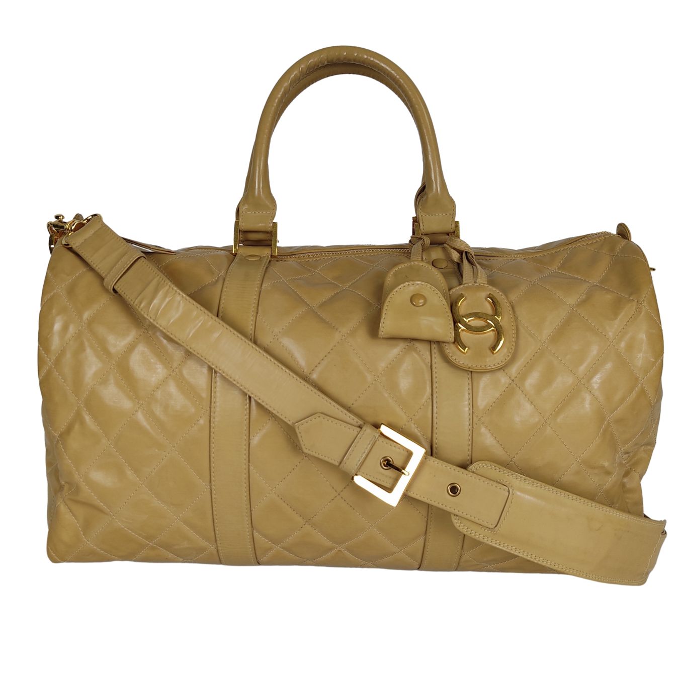 Quilted Travel Bag In Patent Leather