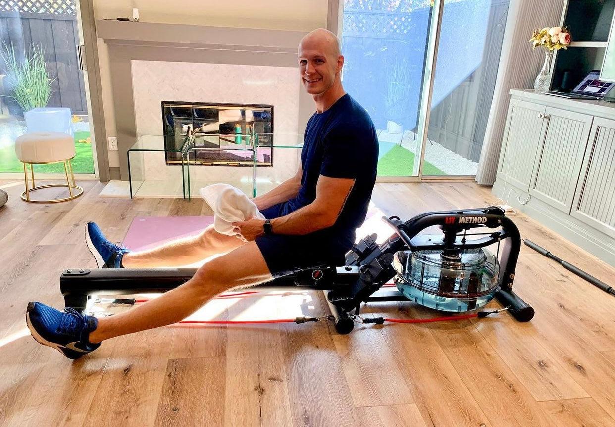 A man sitting on the LIT Strength Machine