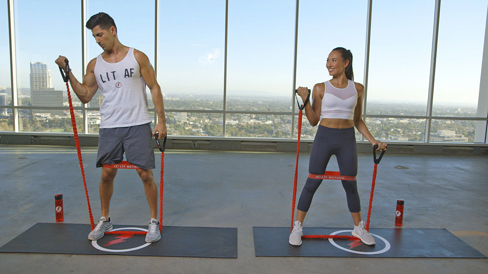 Justin and Taylor Norris doing exercise by using resistance band