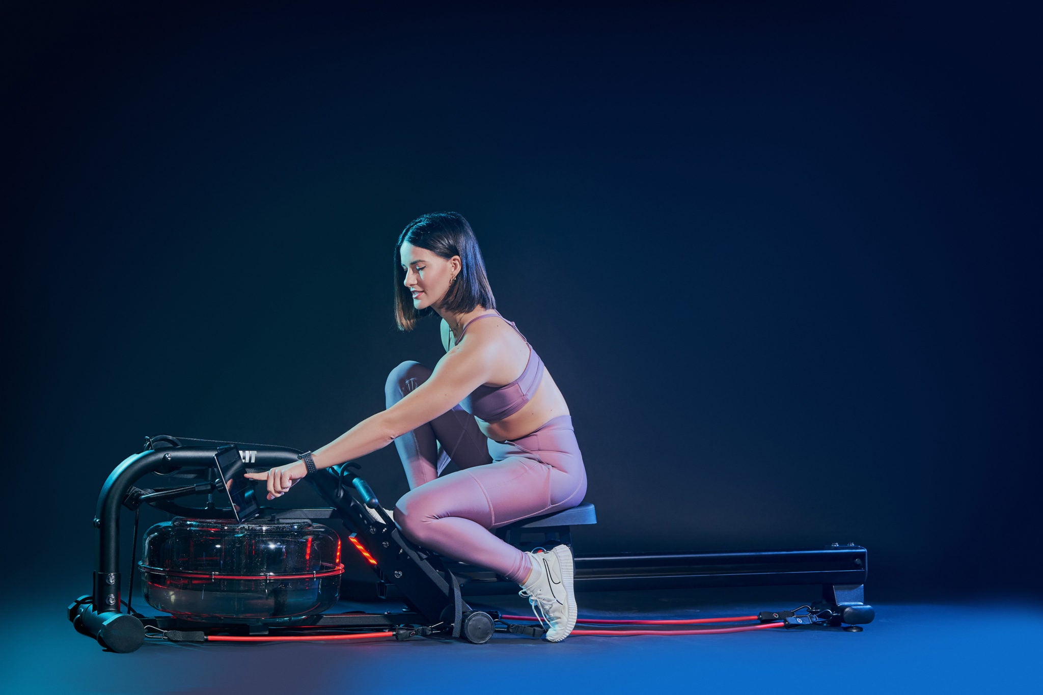 LIT Trainer Tiffany Wolff using the LIT Strength Machine