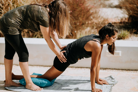 A woman performing Restorative yoga