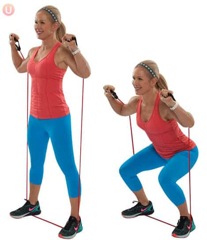 Image of woman doing squats and shoulder press using resistance bands