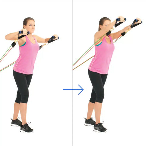 A woman doing standing incline chest press using resistance bands