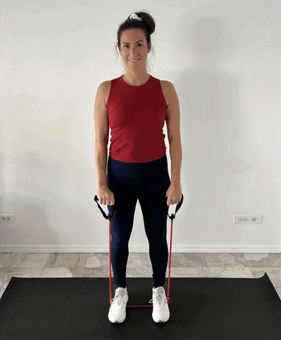 Image of woman performing front raise using resistance bands
