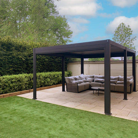 Pergola with sofa set underneath