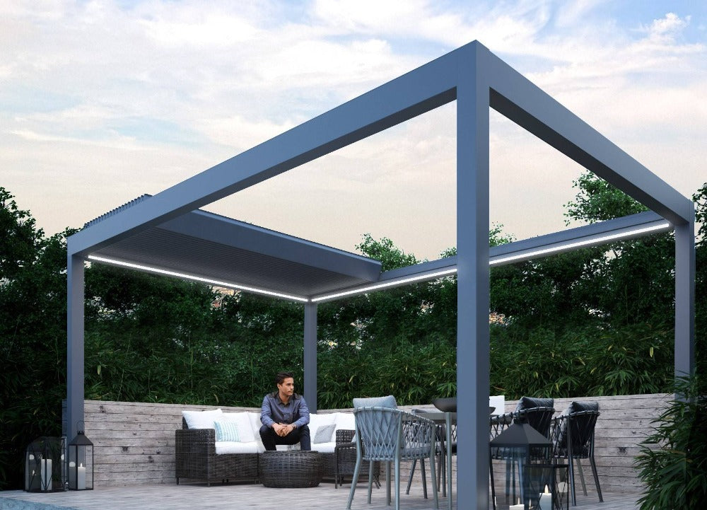 Deponti Pinela Deluxe Electric Retractable Aluminium Pergola - Open Roof with Man Sitting on the Sofa