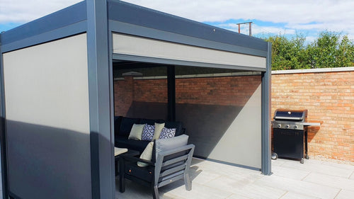 Eclipse Motorised Pergola with Screen Blinds and Sofa Set inside