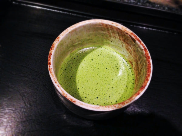 Matcha green tea in a matcha teacup