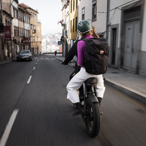 Two people on a 50 Rebels R-Series electric bicycle