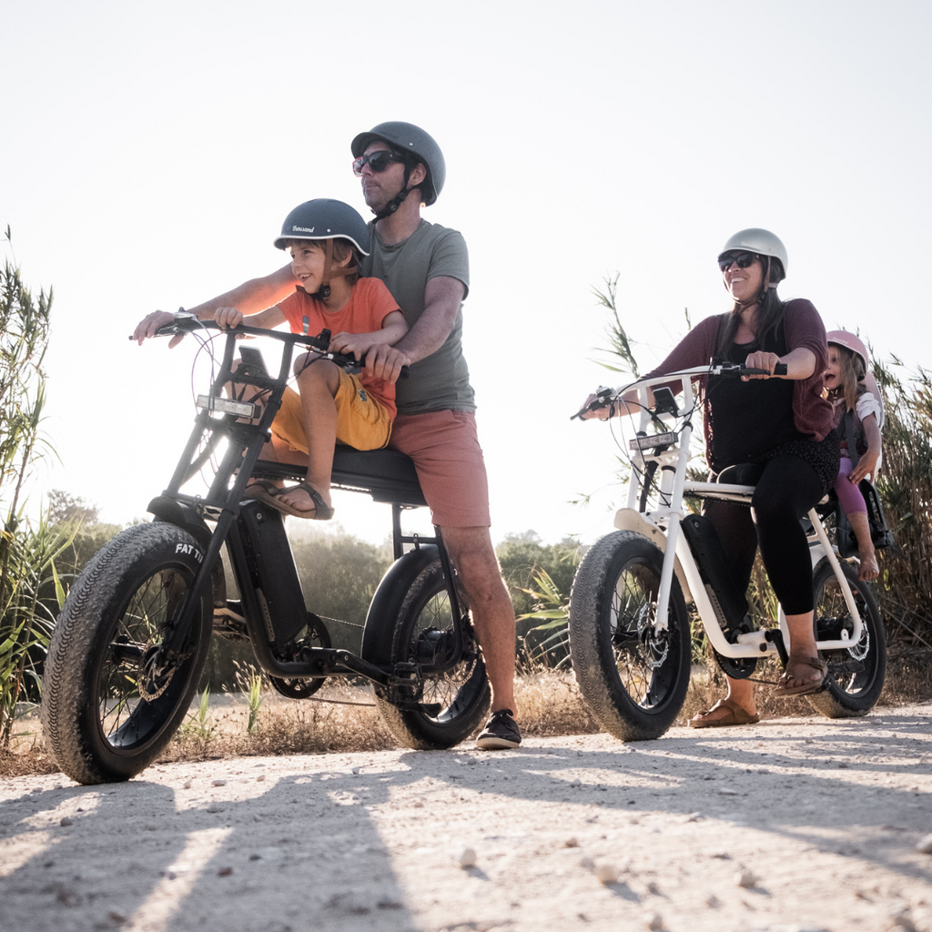 Family of 5 in 2 50 Rebels ebikes