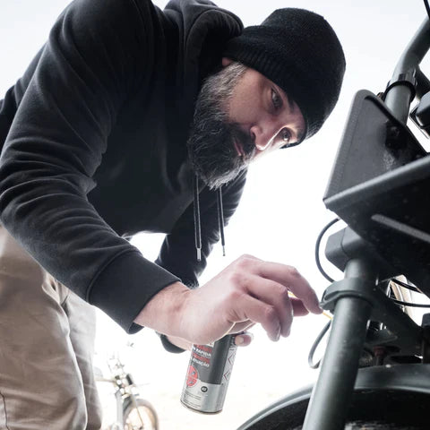 Man doing some maintenance to 50 Rebels ebikes