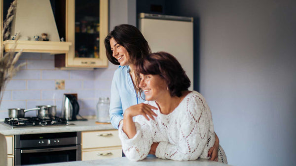 mother and daughter cooking