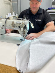 Jason our upholsterer on the sewing machine