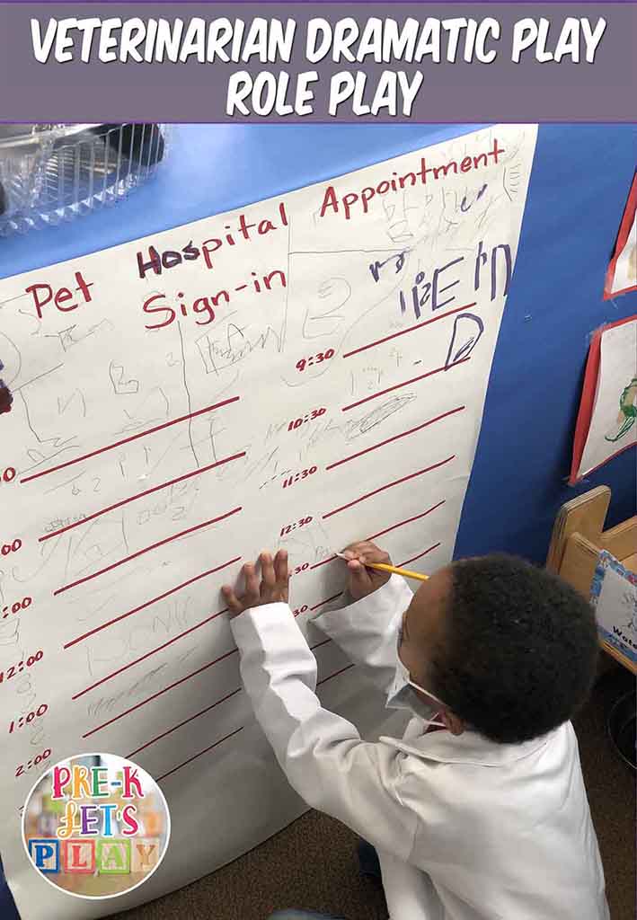 Kids practicing their names in the pet vet dramatic play hospital. They are pretending to schedule appointments for pretend play.