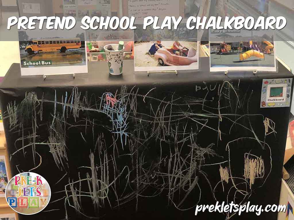 Hand made pretend school play chalkboard for dramatic play. Great to use for fine motor skills practice.